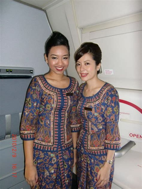 Charming Flight Attendants In Singapore Airlines Flight