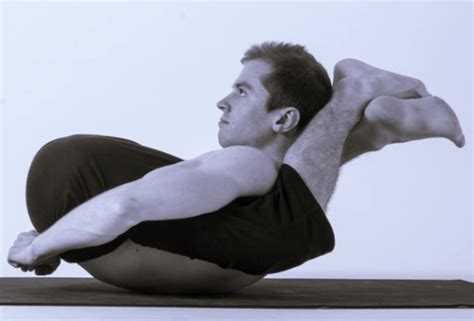 person hard yoga poses crow pose