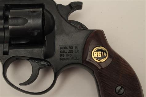 rg   caliber double action  shot revolver   good  condition  holster modern