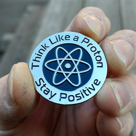 enamel pin think like a proton stay positive science lapel