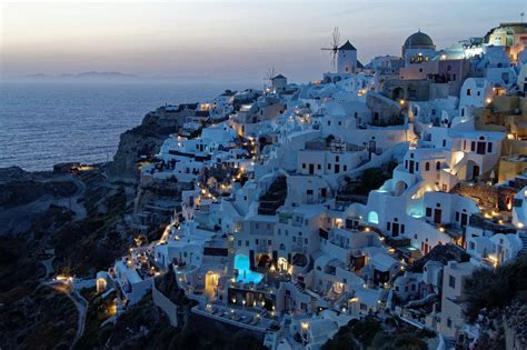 places  visit  santorini greece land  stunning sunsets