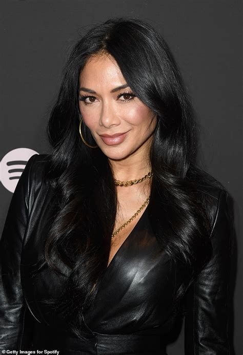 nicole scherzinger oozes sex appeal in a deeply plunging leather jumpsuit daily mail online