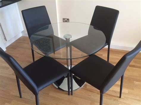 glass pedestal dining table  chairs  angel london gumtree