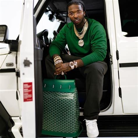 rapper pop smoke arrested in ny caught with stolen rolls royce