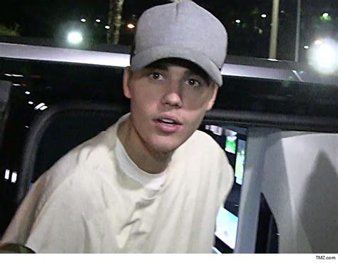 justin bieber shells out peanuts to end paparazzi lawsuit