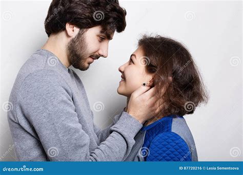 Relations And Feelings Bearded Hipster Touching Gently His Girfriend`s