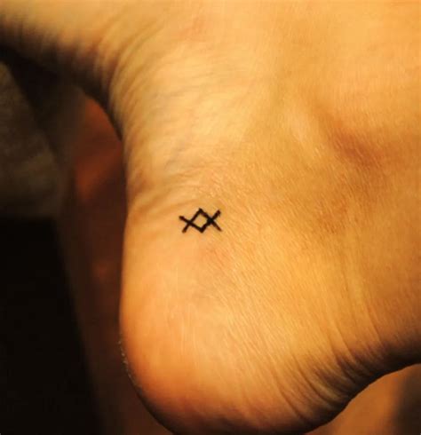20 Tiny Tattoos With Big Meanings Tattoos With Meaning Tiny Tattoos