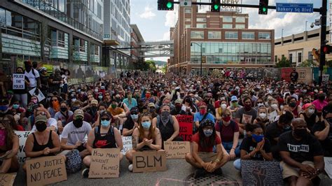 face   police  protesters  portland    heated