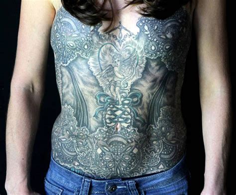tattoo artists cover breast cancer survivors scars with beautiful