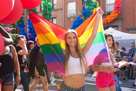 Download Lipstick Lesbian Girl Walking With Flag Wallpaper