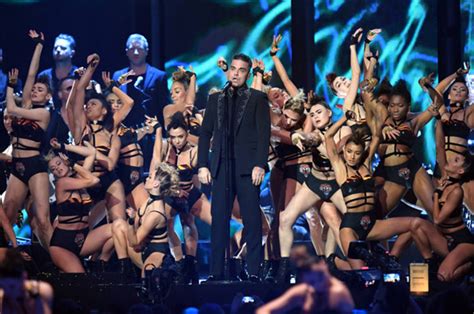brits 2017 dancer suffers x rated wardrobe blunder during robbie song