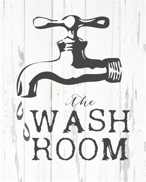 logo   wash room  painted   white wooden background