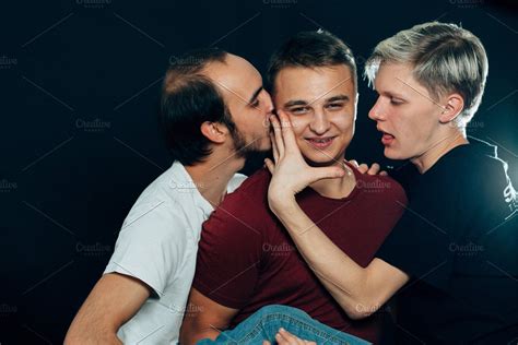 Three Guys Are Gay On Dark Backgroun High Quality People Images