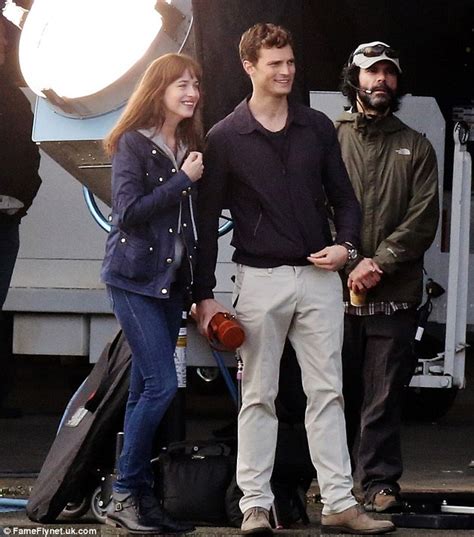 jamie dornan and dakota johnson kiss as reshoots continue for fifty shades of grey daily mail