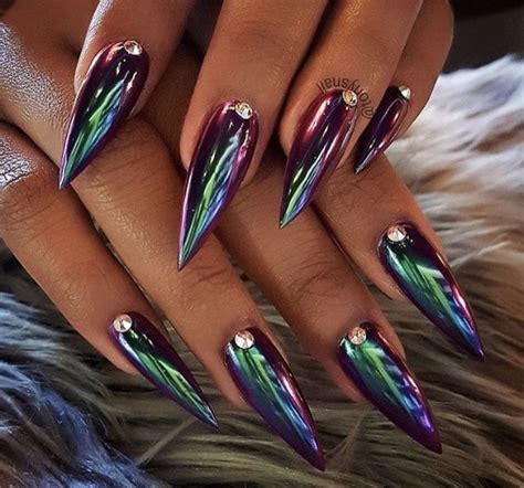 oil slick chrome holographic stiletto nails chrome nails designs chrome nail art nail art
