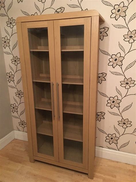 Tall Display Cabinet With Glass Doors In Halifax West Yorkshire