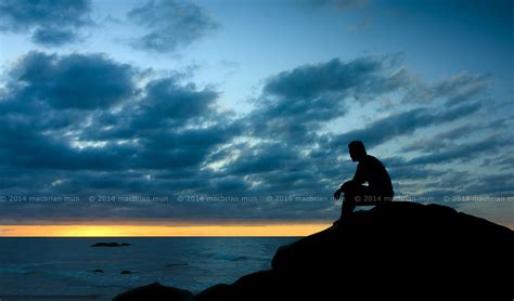 Silhouette Of A Man Sitting Down At Sunset View My Other I Flickr