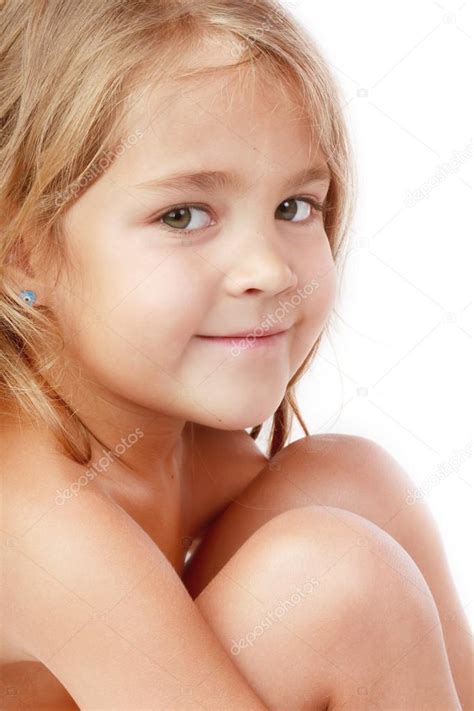 Portrait Of Smiling Cute Little Blond Girl With Green Eyes
