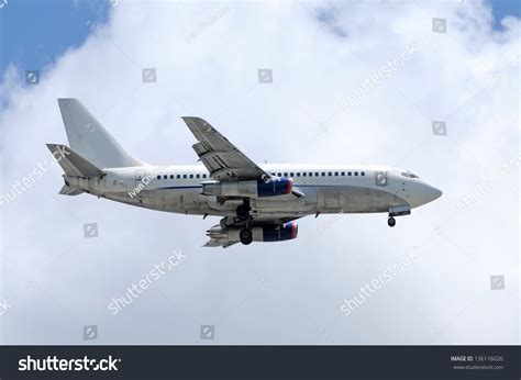 modern passenger jet airplane side view stock photo