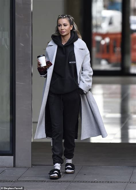 olivia attwood cuts a casual figure in a black tracksuit