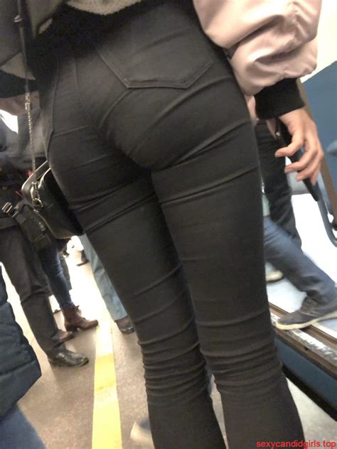 cute ass in tight black jeans subway closeup creepshot
