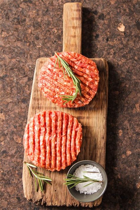 raw ground beef meat burger steak cutlets stock image image  board