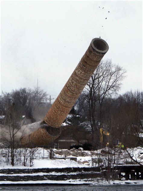 smokestack toppled at former paper mill the daily