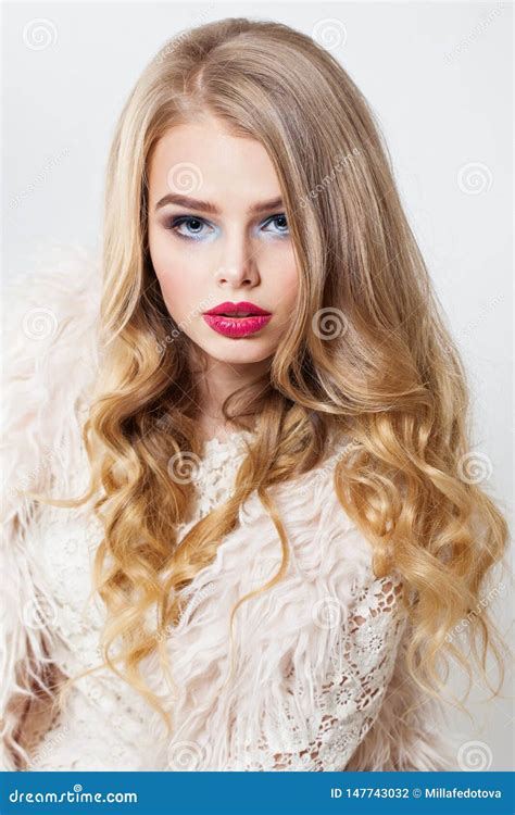 Blonde Woman With Perfect Curly Hair And Makeup Beautiful Model