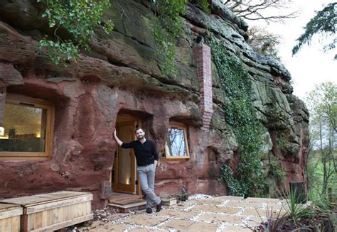 man transforms cave into house with wifi and underfloor