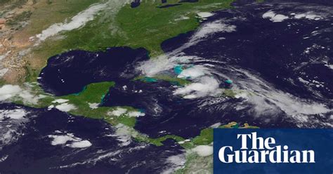 tropical storm isaac passes through cuba and the dominican republic towards florida in pictures