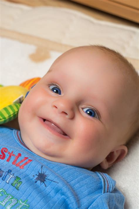 images person play sweet boy cute human blue baby facial expression smile face