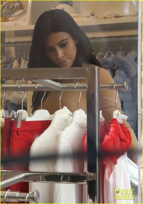 kim kardashian puts curves on display during paris shopping trip photo