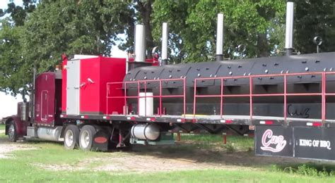 worlds largest bbq pit  cook  tons  meat   time