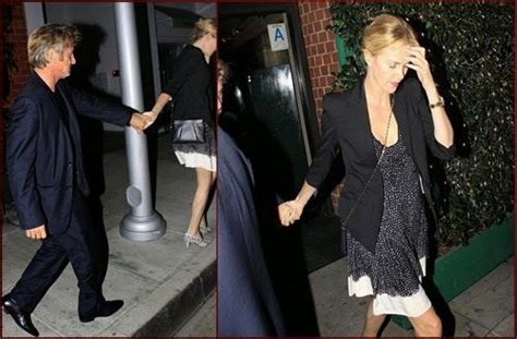 charlizetheron and seanpenn hold hands on date n
