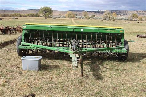 john deere  grain drill   sgl disc grass attch musser bros