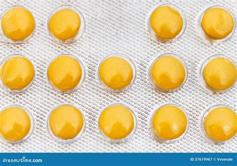 yellow tablets  blister pack close  stock image image  close