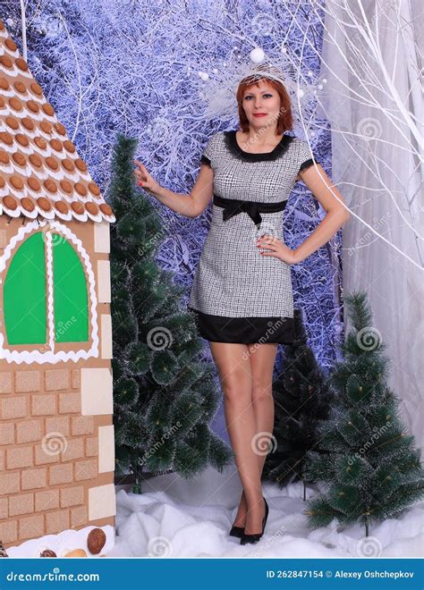 Beautiful Long Legged Redhead Girl In Shiny Stockings And Heels Posing