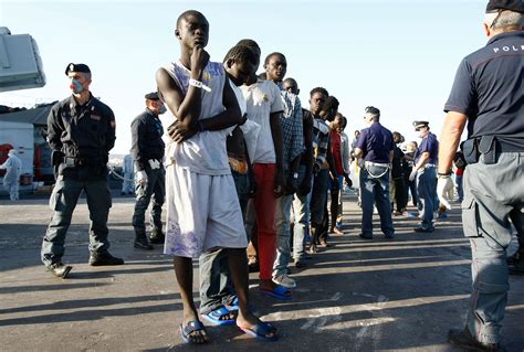 what happens to african migrants once they land in italy