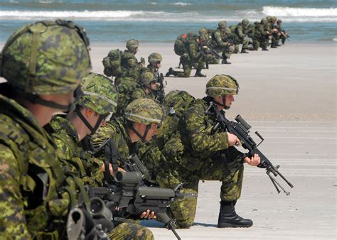 fileus navy     canadian soldiers storm  beach