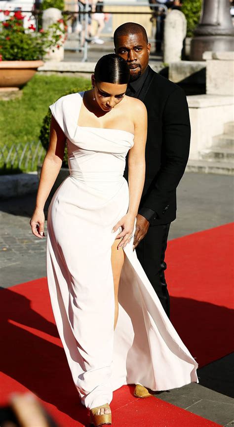 kim kardashian flashes her underwear in daring thigh high split gown