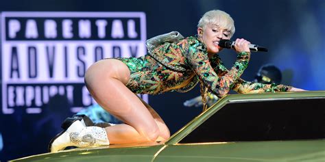 Miley Cyrus Bangerz Tour Twerking Singer Spits Water At Fans During
