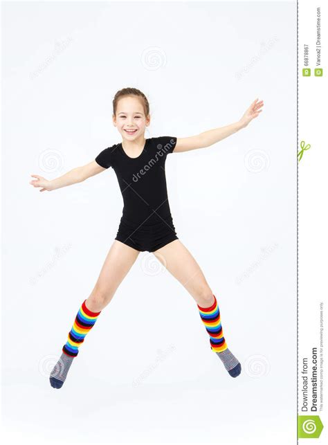slim teen girl doing gymnastics dance in jumping on white stock image image of athlete