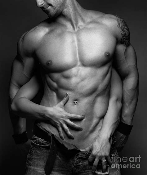 woman hands touching muscular man s body photograph by maxim images prints
