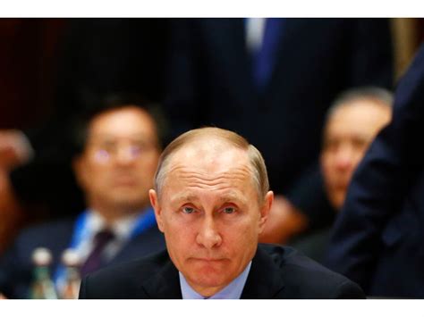 Vladimir Putin Says Some Patriotic Russians May Be Hackers Report