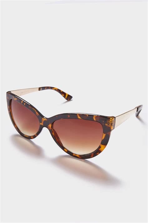 tortoiseshell cat eye sunglasses with gold tone arms and with uv 400