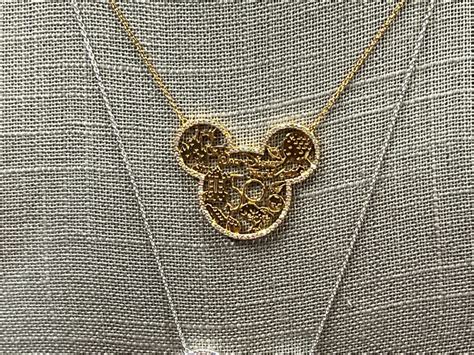 rebecca hook walt disney world  anniversary necklaces released wdw news today