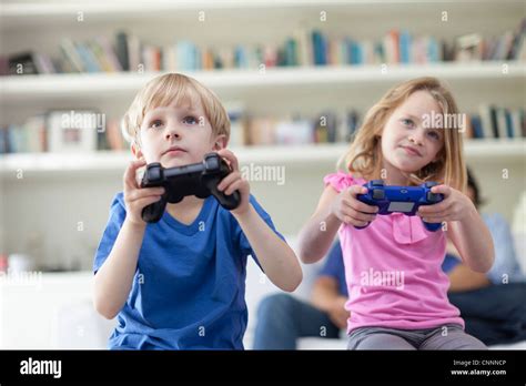 children playing video games  stock photo alamy