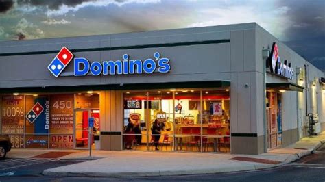 dominos pizza  exit foreign markets pm news