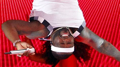 Heres Why 50 Cent Hung Upside Down During His Super Bowl Performance