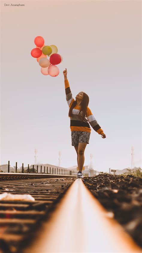 happy girl balloons train track photography  ultra hd mobile wallpaper
